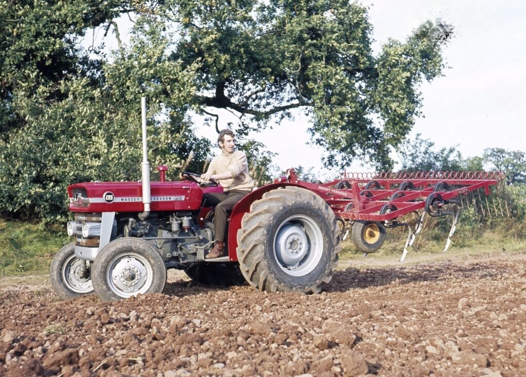 Massey ferguson 135 working on fields